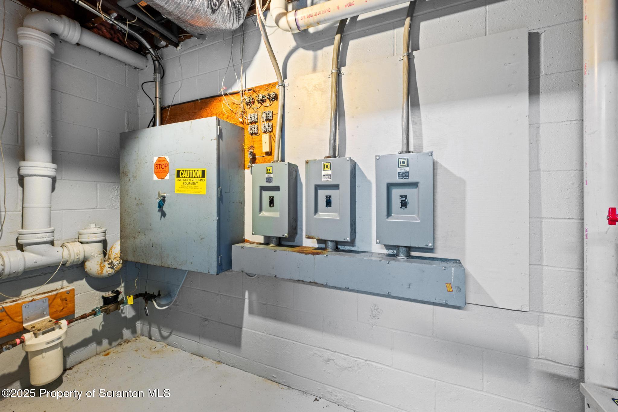 2001 Cleveland Avenue Scranton, PA 18505 - Photo 57 of 87 a bathroom with a granite countertop sink and a mirror