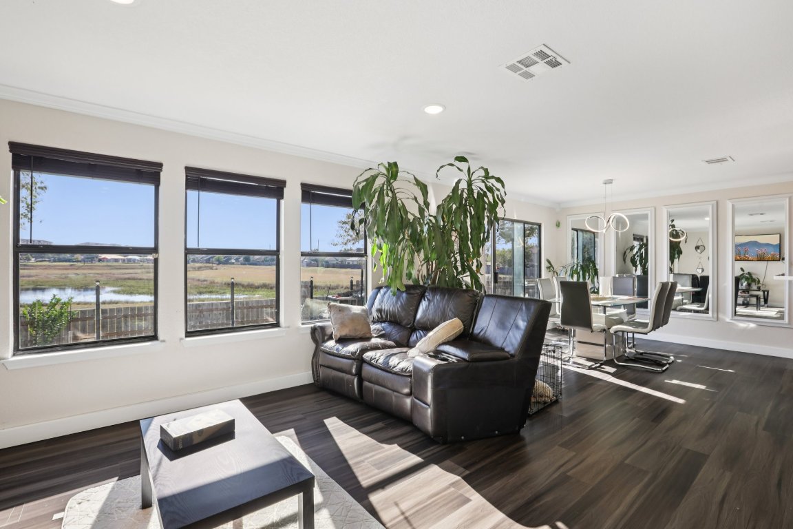 6605 Quinton Drive Austin, TX 78747 - Photo 3 of 19 a living room with furniture and a large window