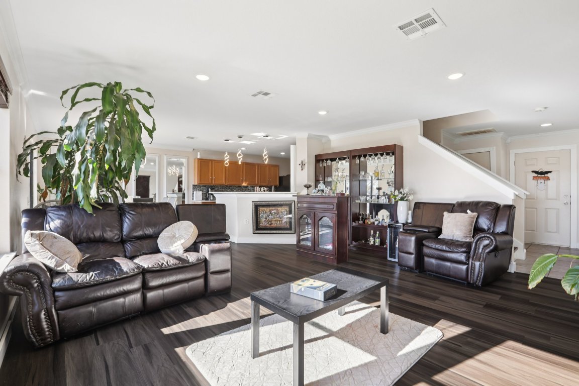 6605 Quinton Drive Austin, TX 78747 - Photo 4 of 19 a living room with furniture kitchen view and a table