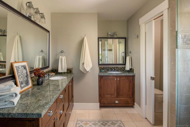 a view of living room with granite countertop furniture and fireplace