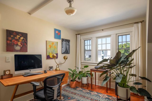 a view of a workspace with furniture
