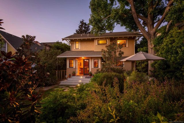 a view of a chairs and table on the patio