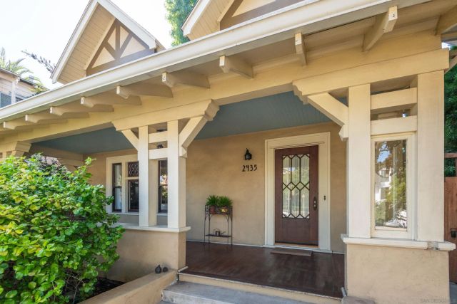 a front view of a house with a porch