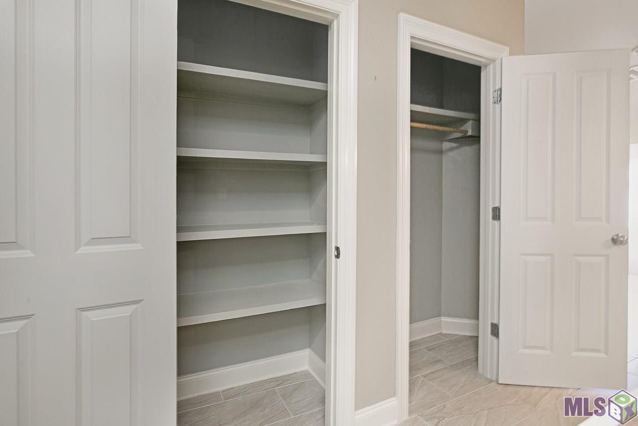 12500 Old Hammond Highway, Unit M2 Baton Rouge, LA 70816 - Photo 11 of 22 Pantry and Coat closet