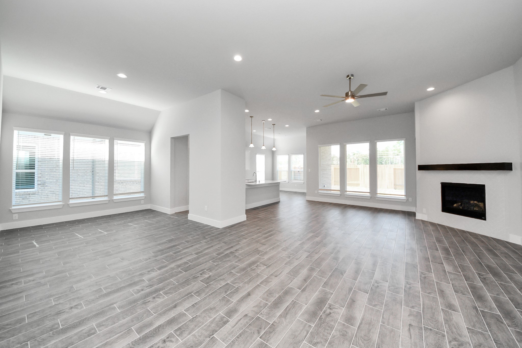 3121 Skerne Spring Dr Spring Spring, TX 77373 - Photo 14 of 44 Make memories gathered around the table with your family and friends! This spacious dining room features elegant flooring, custom paint, and adjacent to family room and kitchen for open concept feel.