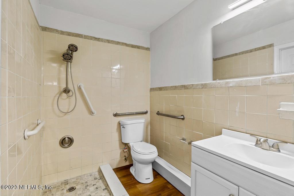 3616 Freeman Road Jacksonville, FL 32207 - Photo 29 of 41 a bathroom with a toilet sink and shower