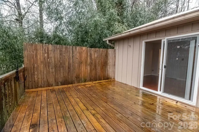 a view of outdoor space with wooden floor
