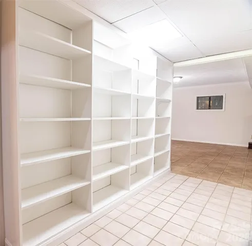 a view of an empty room with empty racks