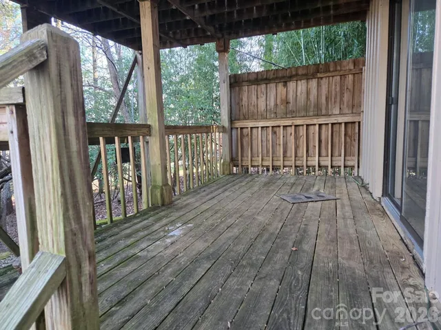 a view of backyard with wooden floor