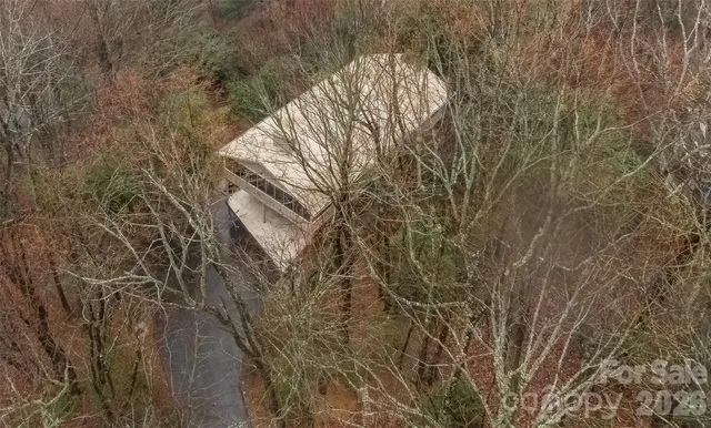 a backyard of a building with lots of green space