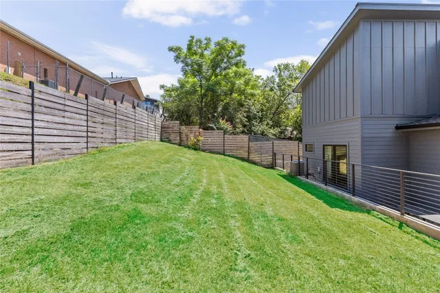 a view of a backyard with a garden