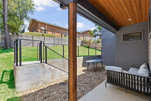 a view of a porch with furniture