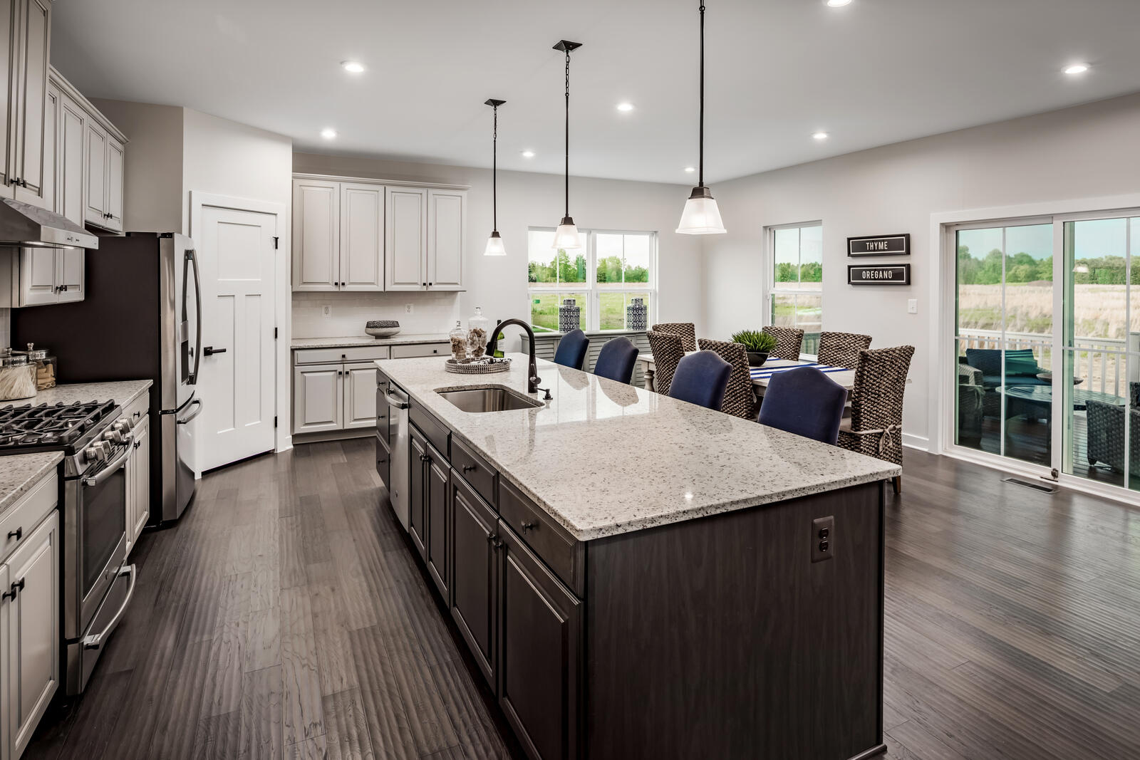 7236 Fairway Rdg Circle Salem, VA 24153 - Photo 4 of 26 a kitchen with stainless steel appliances granite countertop sink stove top oven and refrigerator