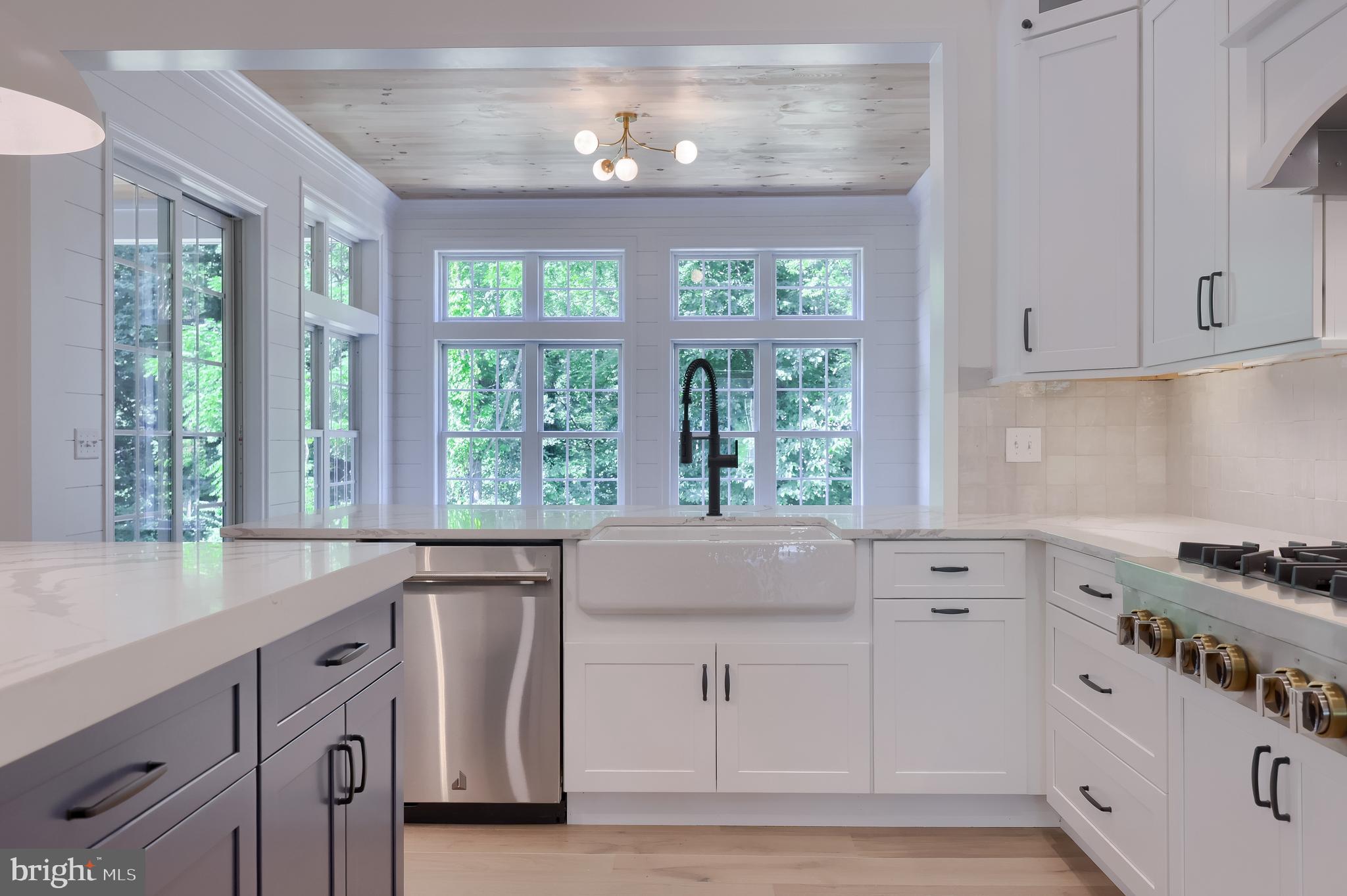 421 Southampton Drive Lititz, PA 17543 - Photo 12 of 49 a kitchen with stainless steel appliances white cabinets and a window