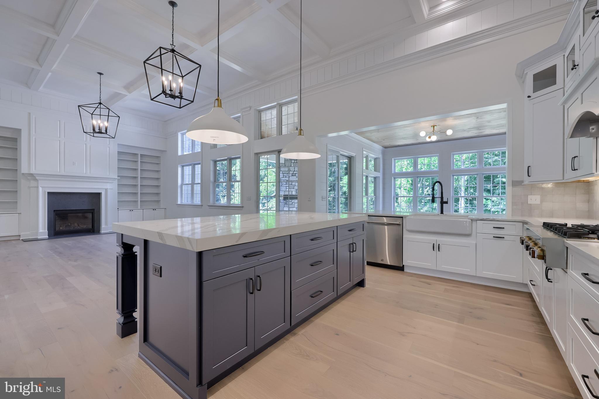 421 Southampton Drive Lititz, PA 17543 - Photo 13 of 49 a large kitchen with stainless steel appliances granite countertop a stove oven and a view of living room