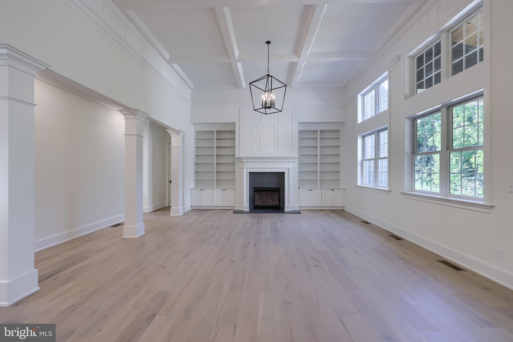 421 Southampton Drive Lititz, PA 17543 - Photo 23 of 49 wooden floor in an empty room with a fireplace