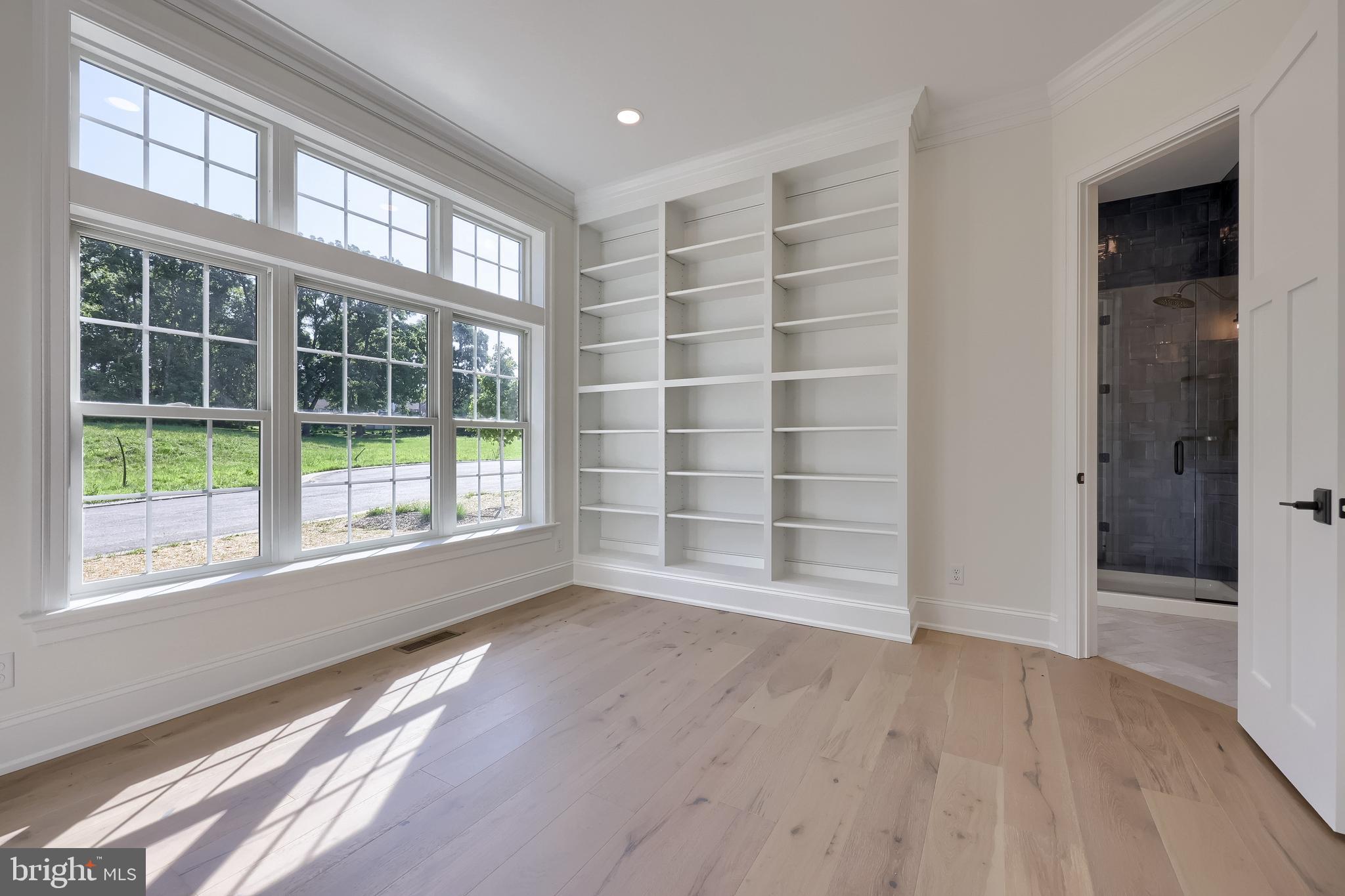 421 Southampton Drive Lititz, PA 17543 - Photo 28 of 49 a view of an empty room with a window and wooden floor