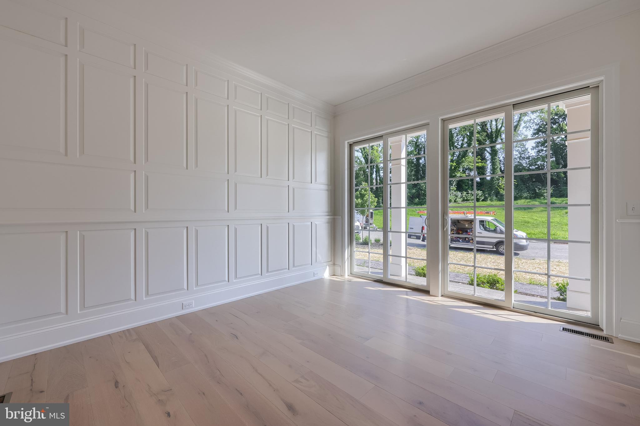 421 Southampton Drive Lititz, PA 17543 - Photo 30 of 49 a view of an empty room with wooden floor and windows