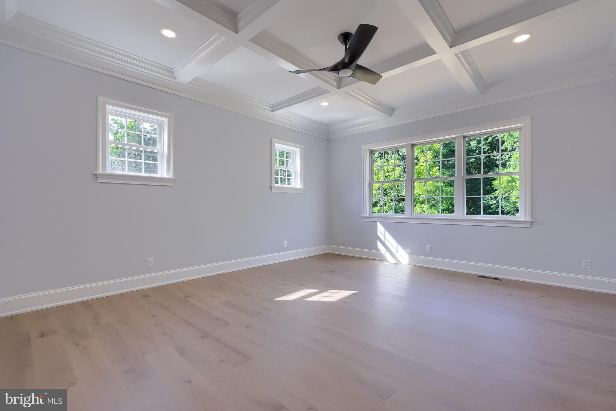 421 Southampton Drive Lititz, PA 17543 - Photo 33 of 49 an empty room with windows and ceiling fan