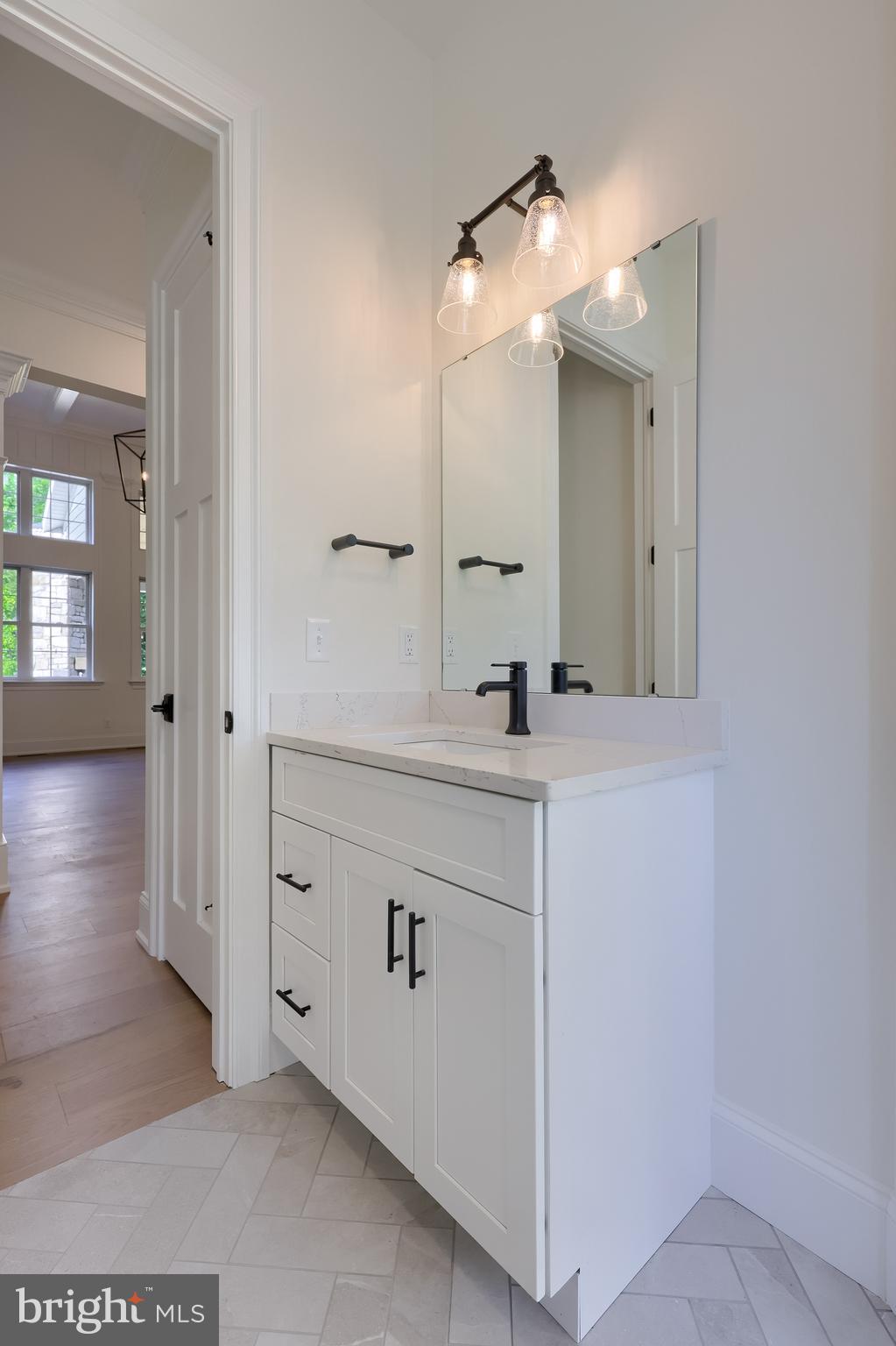 421 Southampton Drive Lititz, PA 17543 - Photo 40 of 49 a bathroom with a sink and a mirror