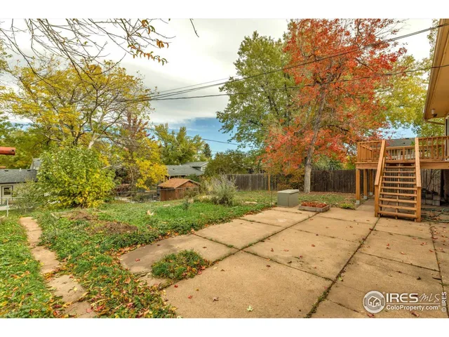 a view of a city with mountains in the background