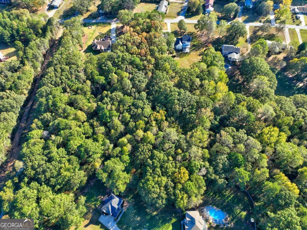 811 Hood Road Fayetteville, GA 30214 - Photo 13 of 15 a view of a lush green field