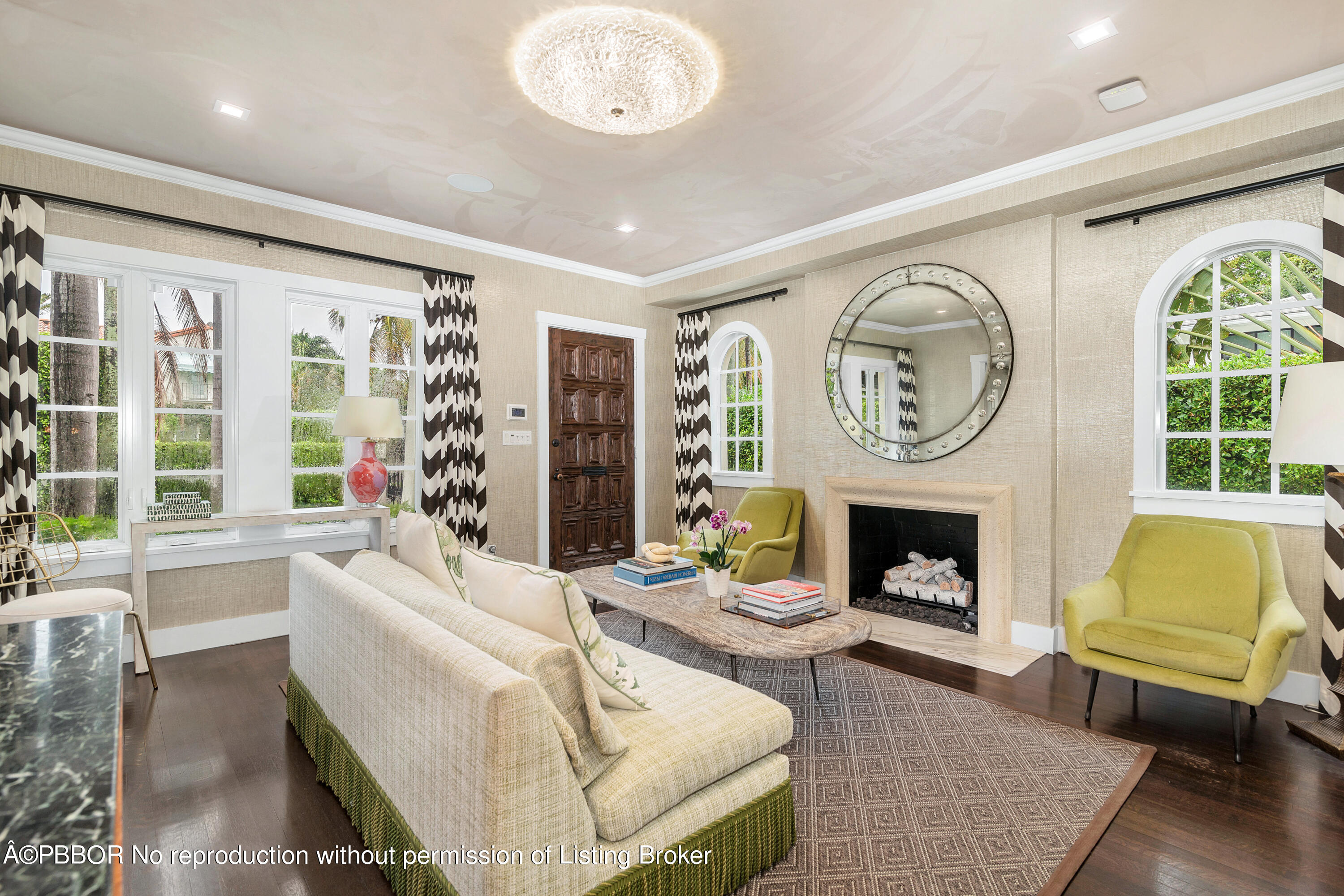 231 Sunset Road West Palm Beach, FL 33401 - Photo 5 of 22 a living room with furniture and a fireplace