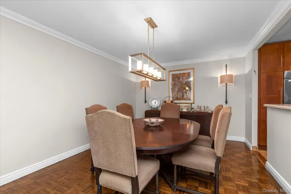 a kitchen with stainless steel appliances granite countertop wooden cabinets a sink and a stove