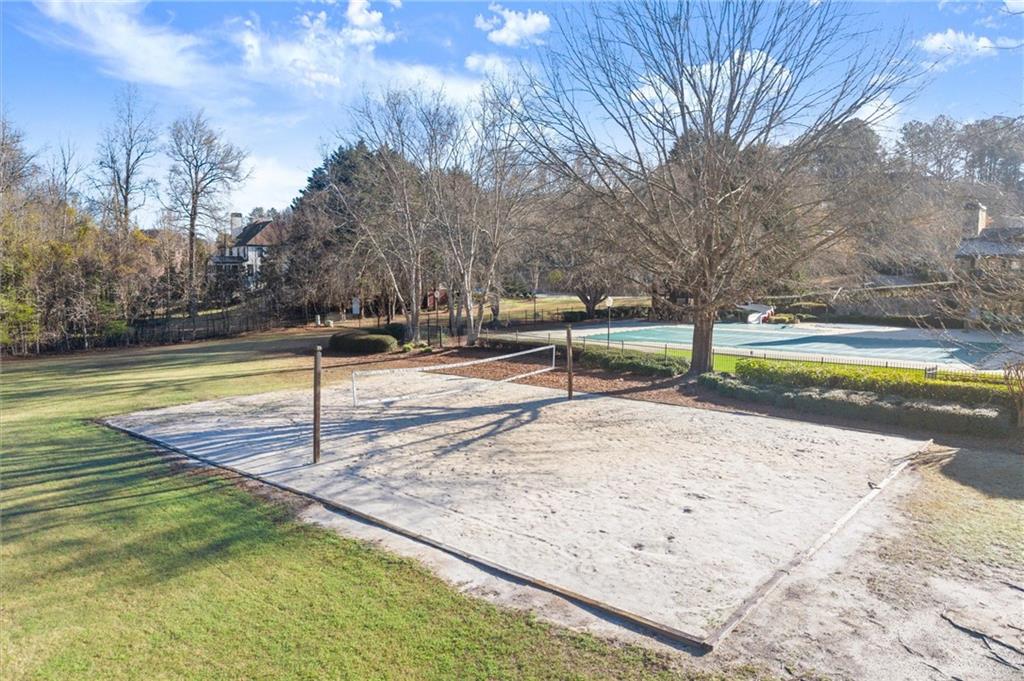 6229 Grand Loop Road Sugar Hill, GA 30518 - Photo 86 of 93 a view of a swimming pool with an outdoor space