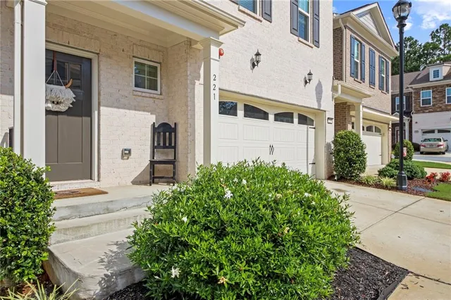 a front view of a building with garden