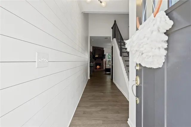 a bathroom with a sink mirror and toilet