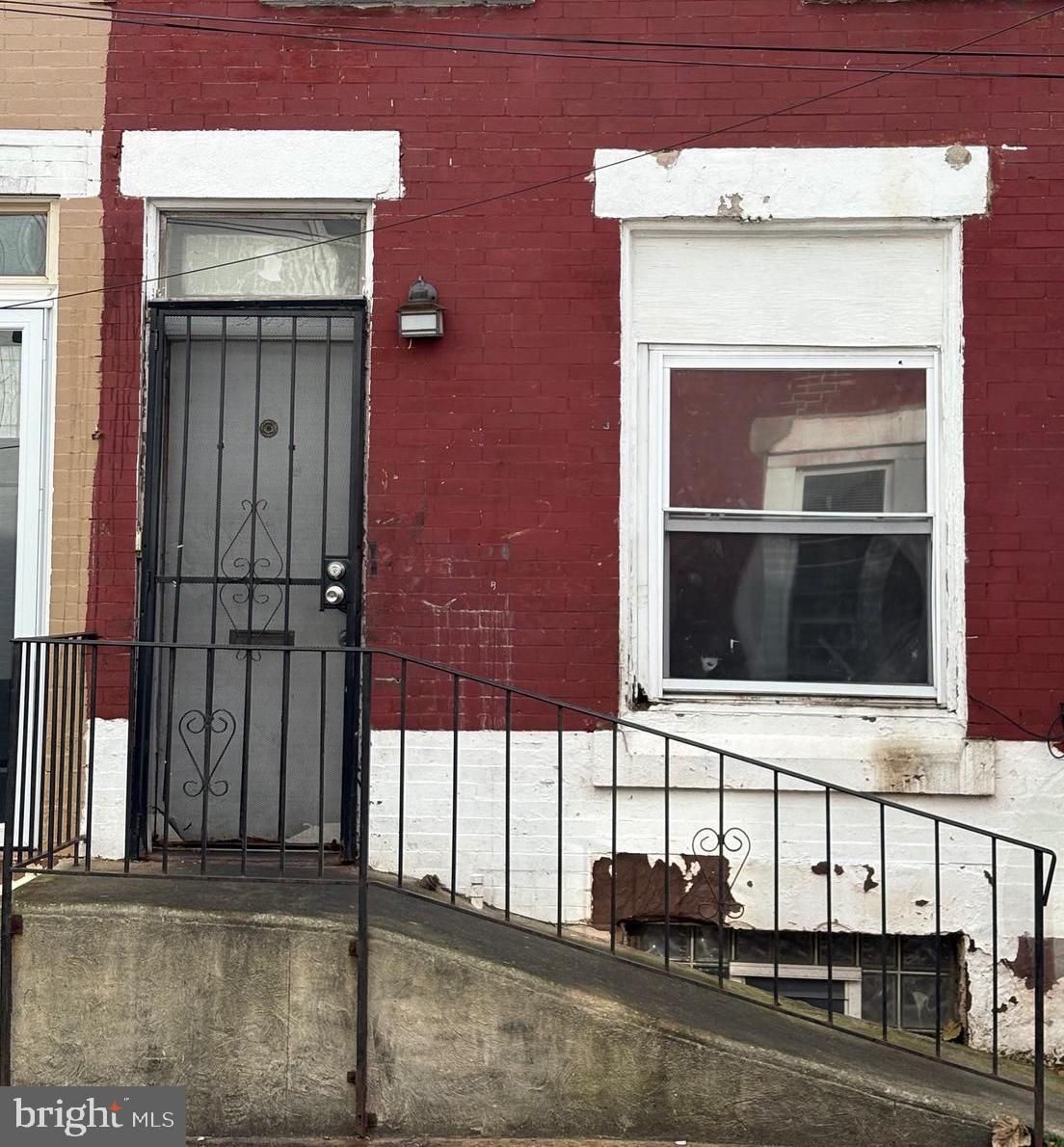 2918 French Street Philadelphia, PA 19121 - Photo 1 of 3 a front view of a house with a street