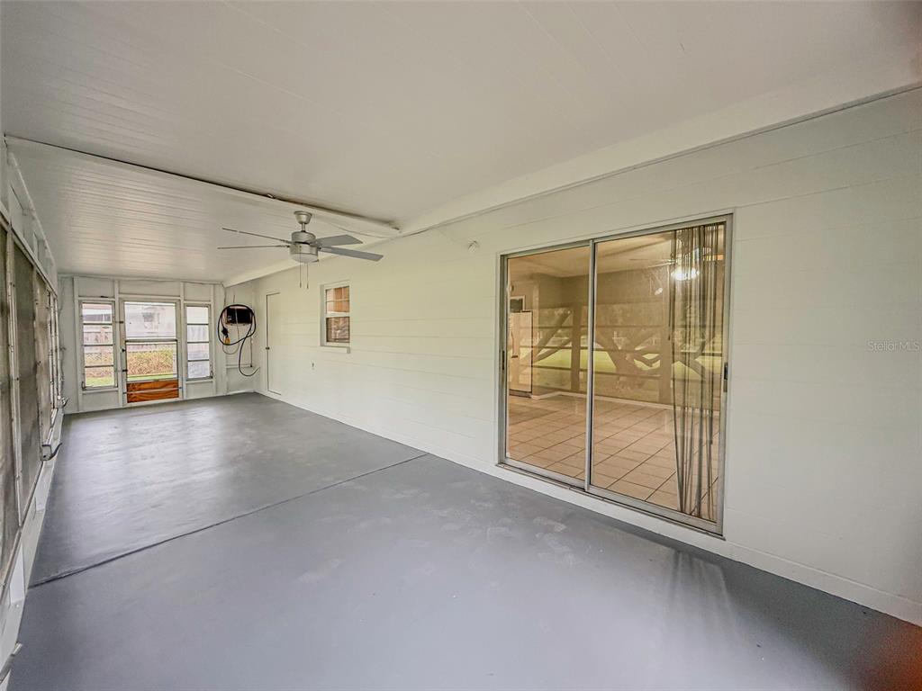 6428 Tula Lane Lakeland, FL 33809 - Photo 17 of 29 a view of empty room with wooden floor and cabinet