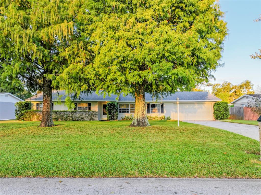 6428 Tula Lane Lakeland, FL 33809 - Photo 23 of 29 front view of a house with a yard