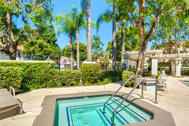 a view of yard with seating area and trees around