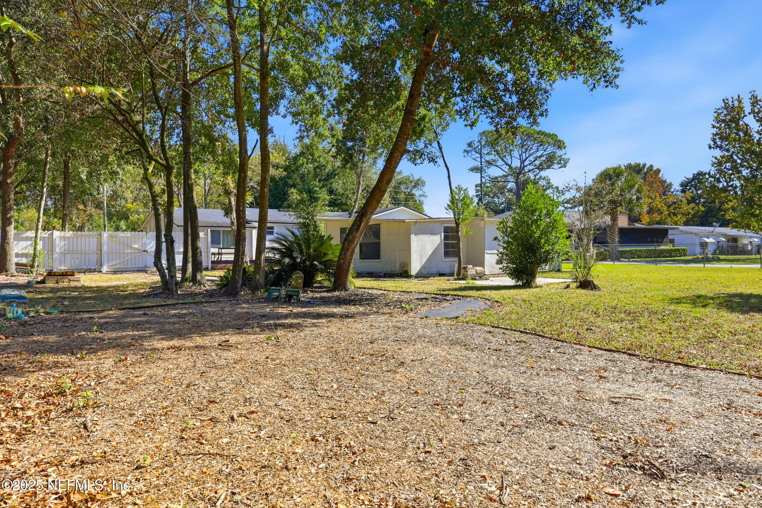 2236 Anniston Road Jacksonville, FL 32246 - Photo 23 of 27 a view of a house with a yard and large tree