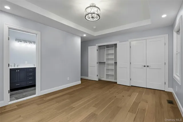 a bathroom with a sink a vanity and a mirror