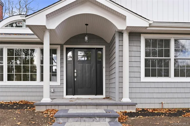 a front view of a house with a window