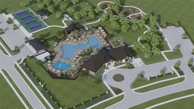 an aerial view of a house with yard swimming pool and outdoor seating