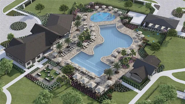 an aerial view of a house with outdoor space