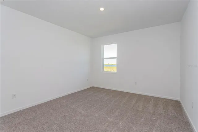a bathroom with a sink double vanity and a mirror