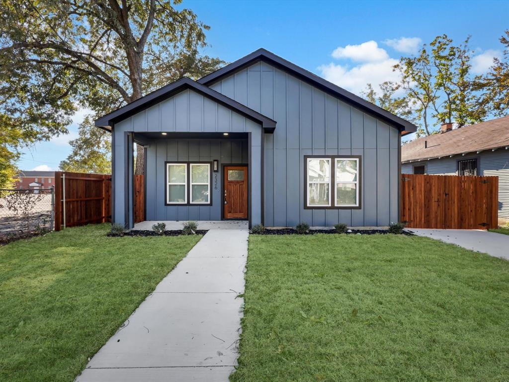2326 Dathe Street Dallas, TX 75215 - Photo 1 of 1 a front view of a house with garden