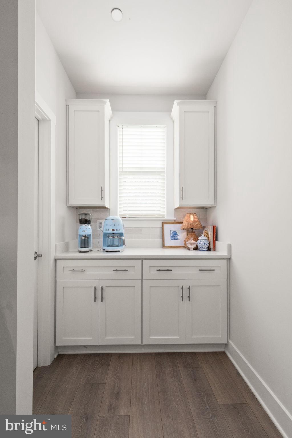 424 Osage Road Cockeysville, MD 21030 - Photo 15 of 52 a kitchen with granite countertop white cabinets and white appliances