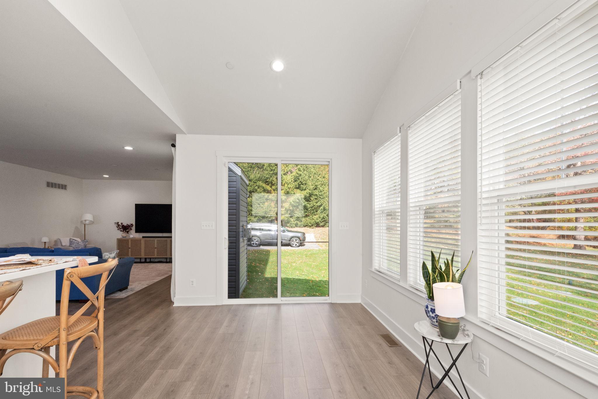 424 Osage Road Cockeysville, MD 21030 - Photo 18 of 52 a view of a room with furniture wooden floor and a window