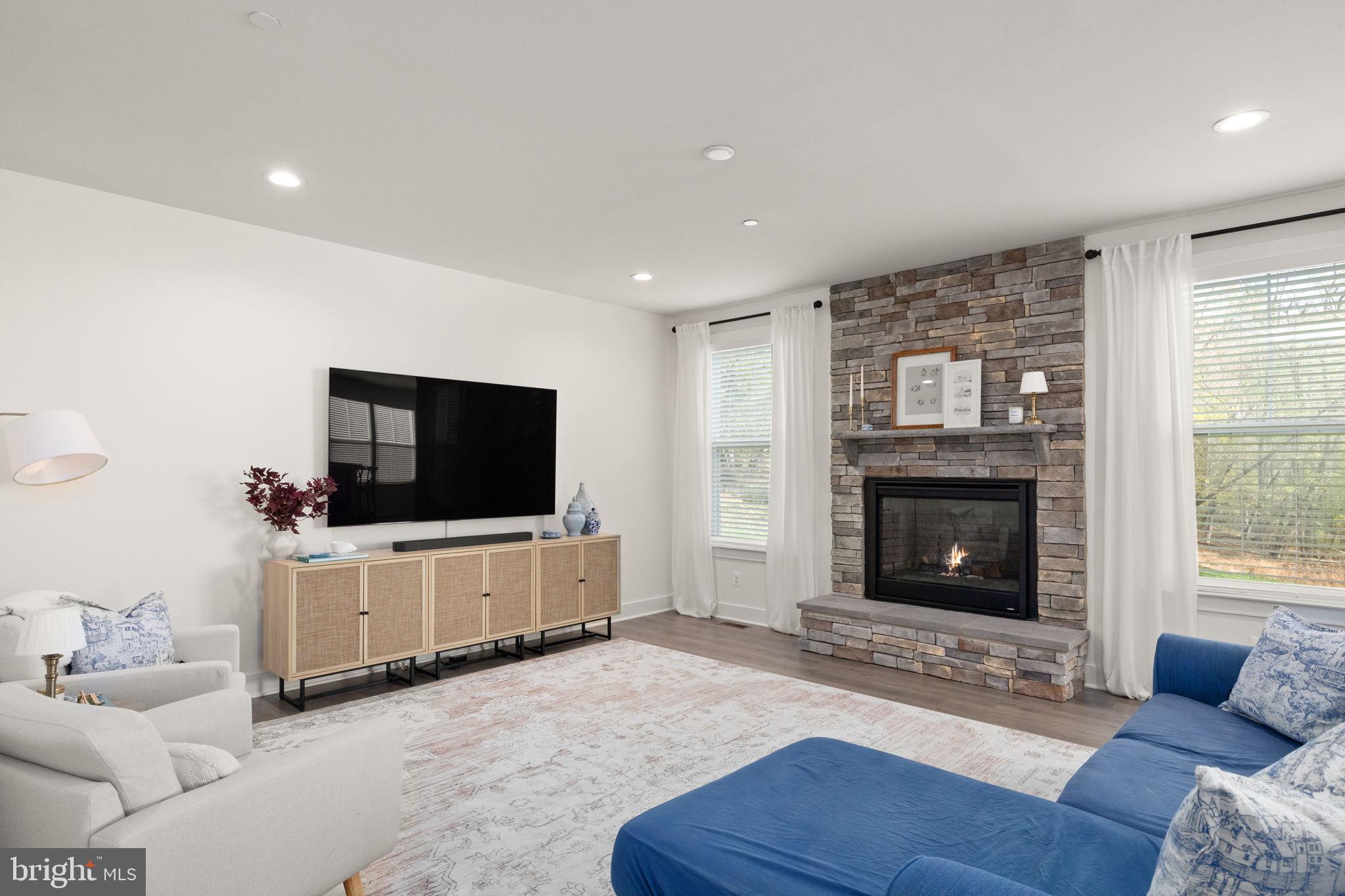 424 Osage Road Cockeysville, MD 21030 - Photo 19 of 52 a living room with furniture and a fireplace or television