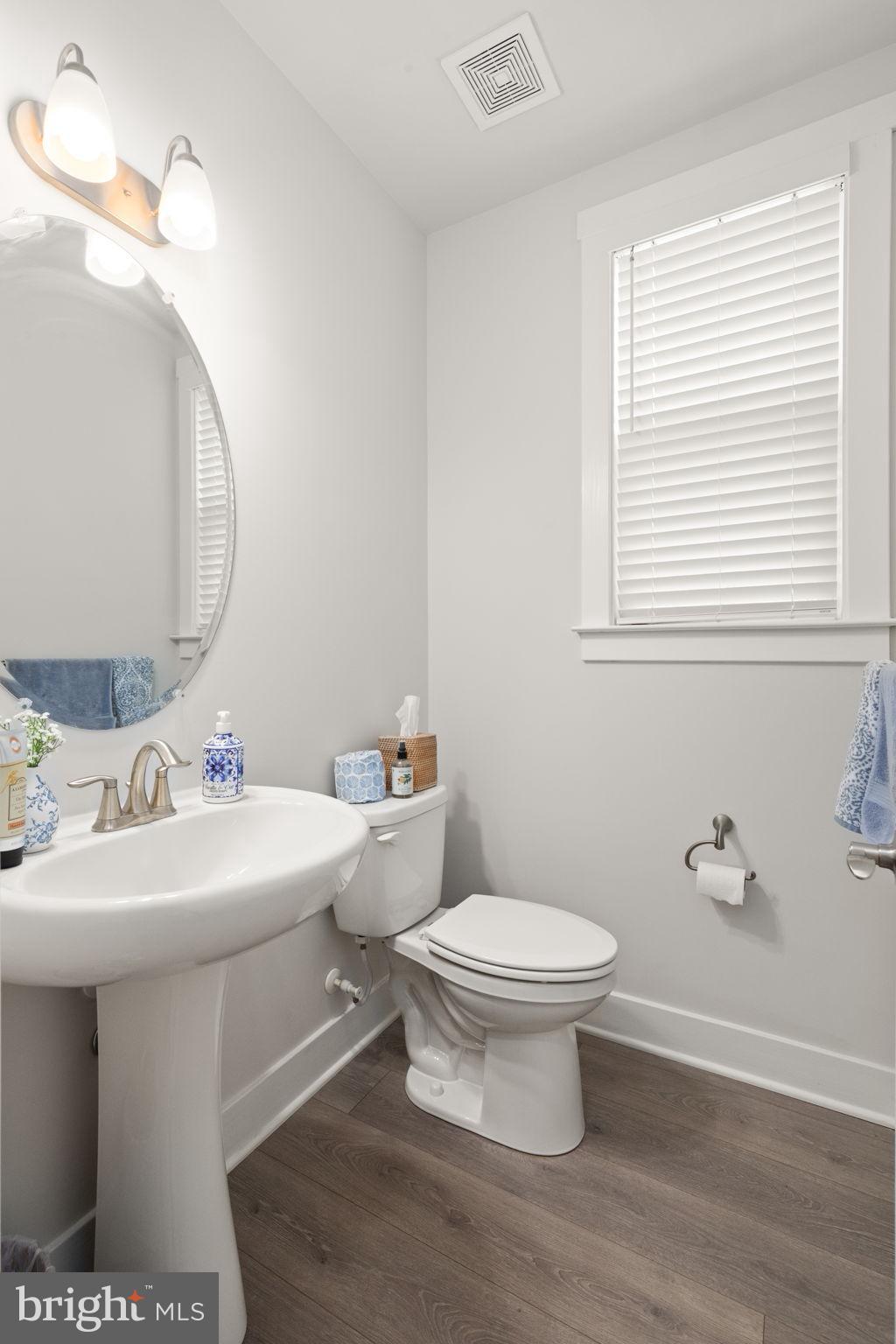 424 Osage Road Cockeysville, MD 21030 - Photo 22 of 52 a bathroom with a sink toilet and a mirror