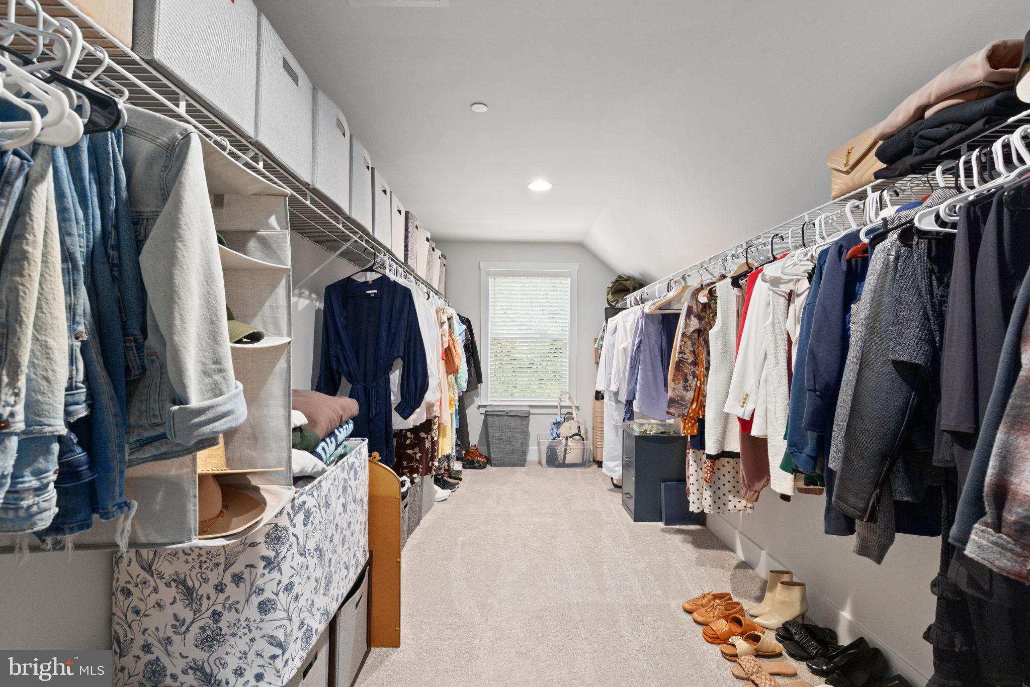 424 Osage Road Cockeysville, MD 21030 - Photo 29 of 52 a view of walk in closet with clothes and shoes