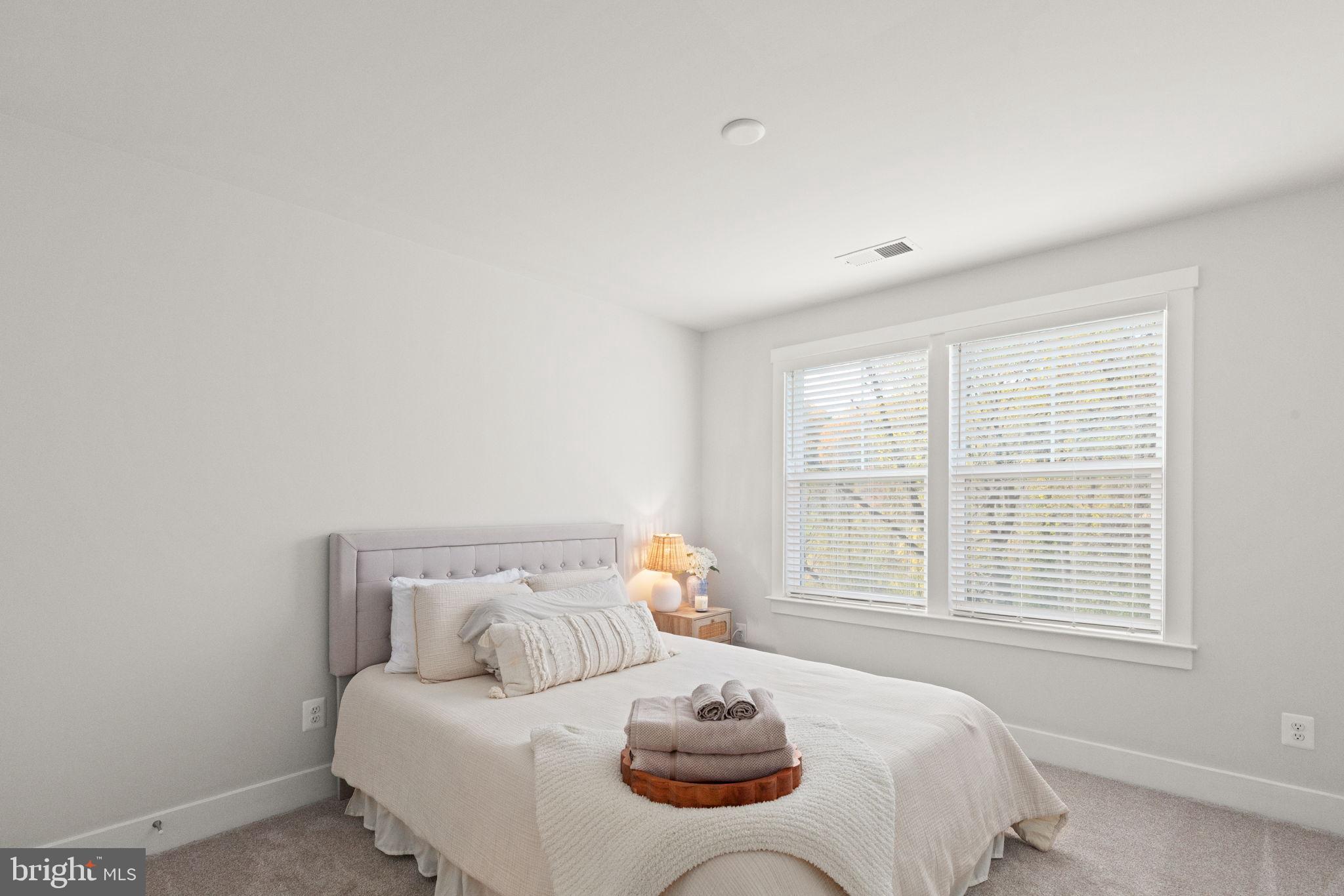 424 Osage Road Cockeysville, MD 21030 - Photo 33 of 52 a bedroom with a bed and window