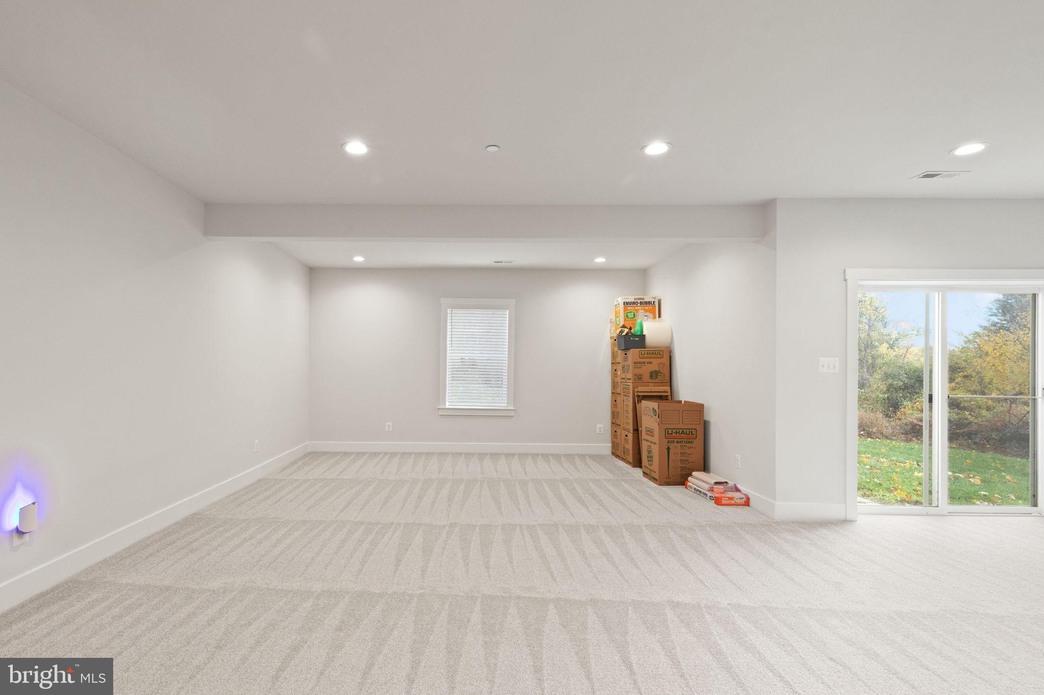 424 Osage Road Cockeysville, MD 21030 - Photo 42 of 52 a view of empty room with wooden floor and window