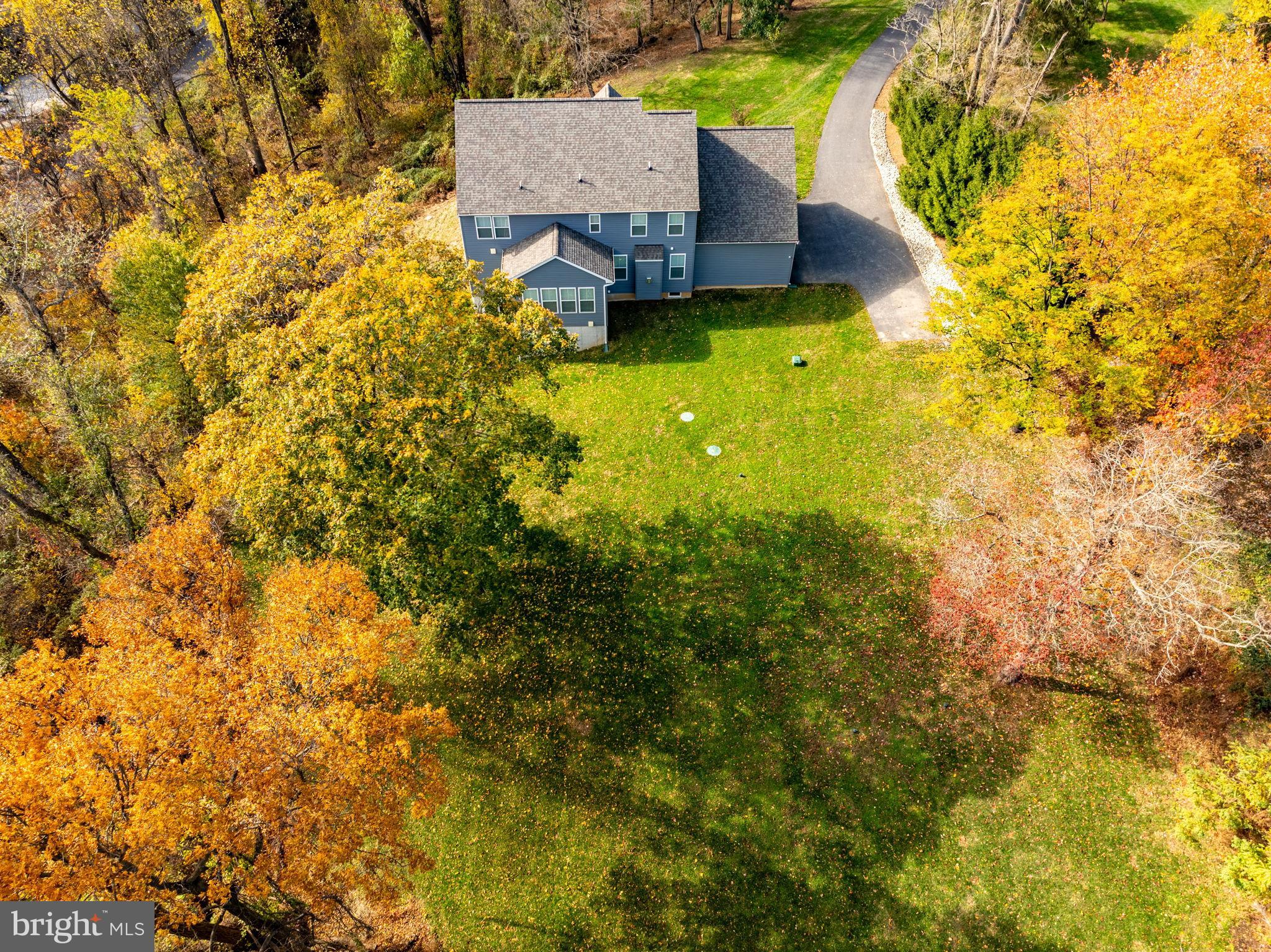 424 Osage Road Cockeysville, MD 21030 - Photo 49 of 52 a view of a house with a yard